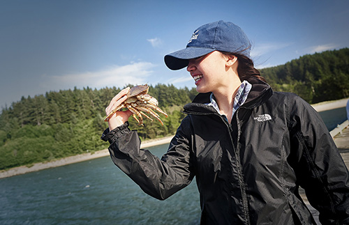 woman outdoors crabbing