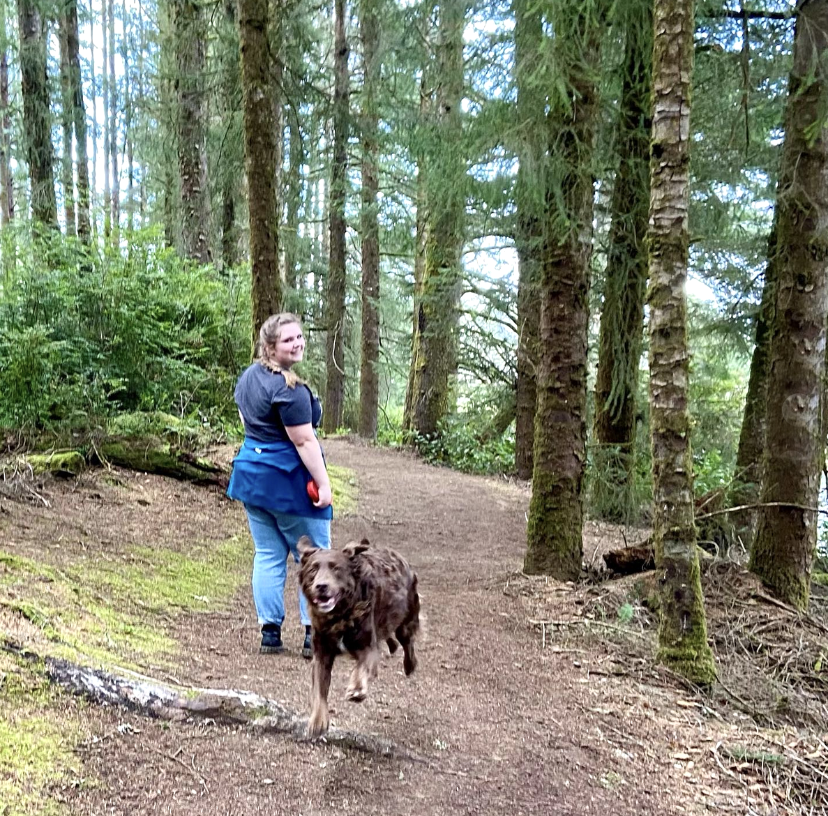 Girl and Dog Hiking in Forest in Bandon, Oregon by Maddyontheoffbeat