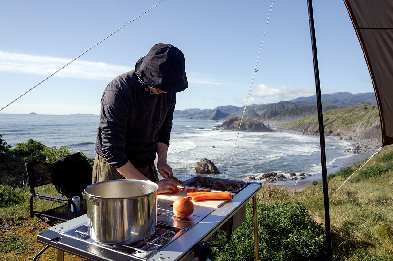 Man Cooking Camping Sisters Rock Oregon by Snow Peak USA