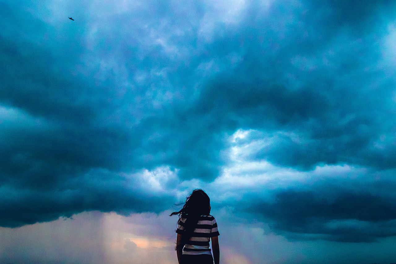 Woman on Beach in the Storm on the Southern Oregon Coast