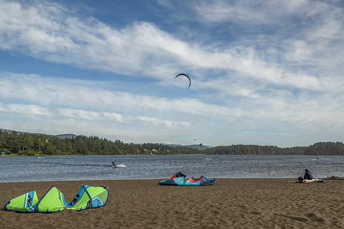 Windsport kites and equipment on the beach at Floras Lake. Windsurfing Floras Lake Langlois Oregon by Manuela Durson