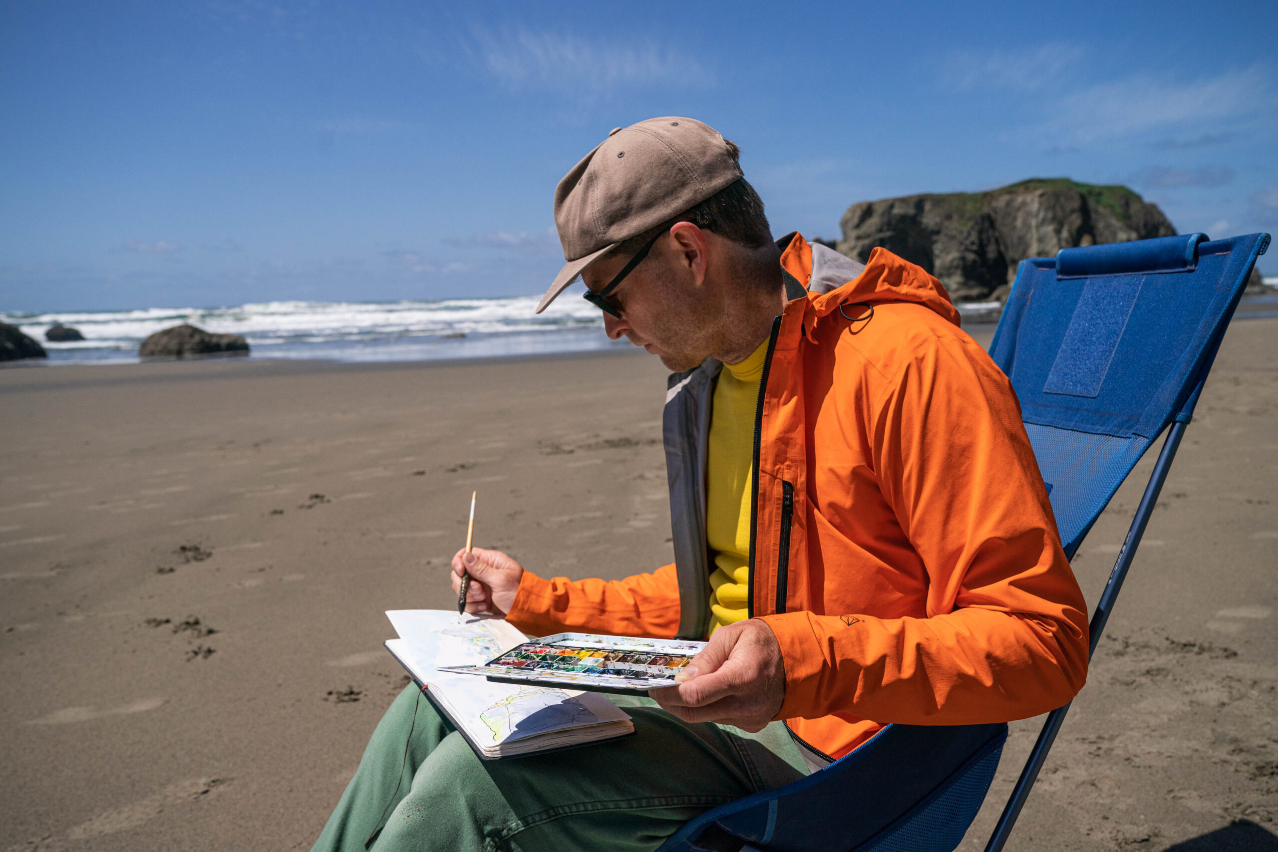 Artist Chris McNally on beach 13 Bandon Oregon by Dylan Van Weelden