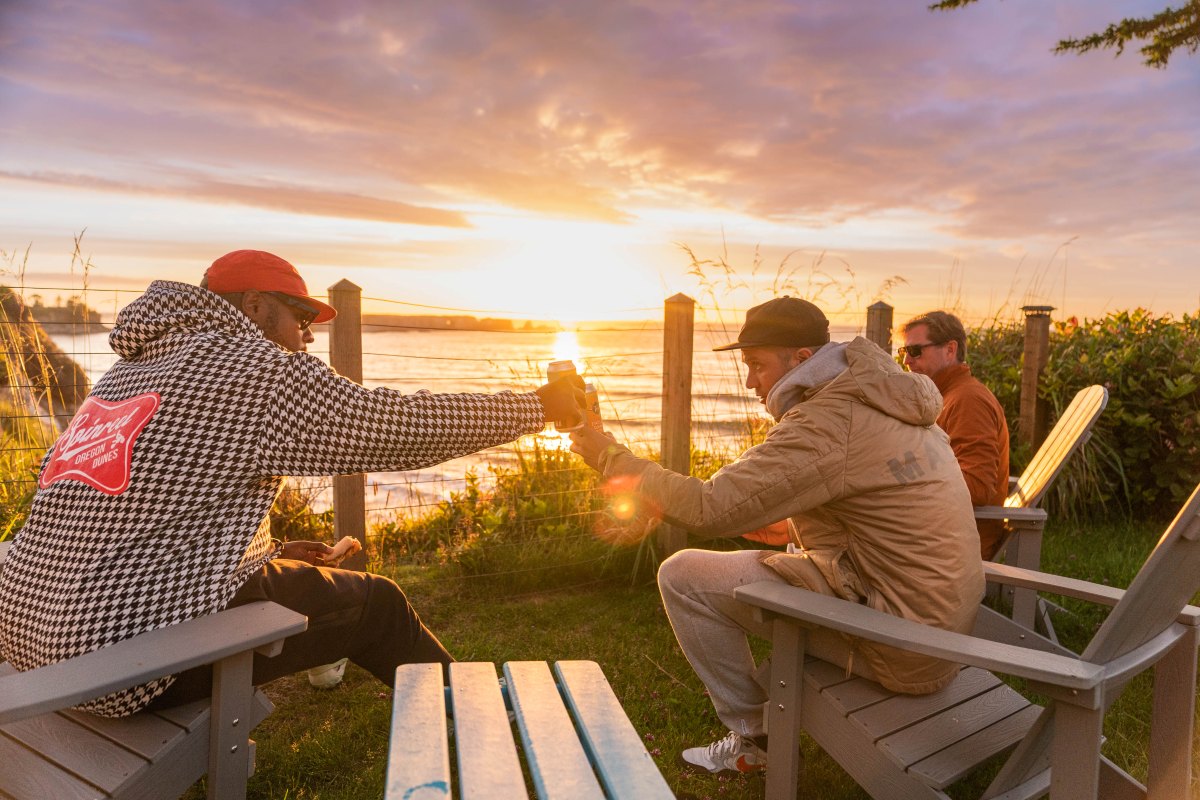 Guys Toasting Vacation Rental Bandon Oregon by Dylan Van Weelden